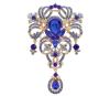 <span class='ref_item'>189 -</span> <span class="object_title">BROCHE EN METAL DORADO CON PIEDRAS DE IMITACIÓN AZULES</span>  <p><span class="technical_description">Broche realizado en metal dorado adornado con piedras de imitación en color azul intenso y otras en azul más claro componiendo bandas y tornapuntas. Lo remata un pendentif.<br/>Cierre: Aguja<br/>Medidas: 9 x 5,5cm</span><br>Peso: <span class="PESO_HCES1">26,50</span> <span class="PESOUMED_HCES1">gr.</span><br></p>