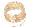 <span class='ref_item'>57 -</span> <span class="description">BRAZALETE ANCHO EN METAL CHAPADO EN ORO Y CIRCONITAS</span>  <p><span class="description">Brazalete ancho realizado en metal chapado en oro. Bellamente decorado con trabajo de filigrana y cuatro juegos de circonitas como estrellas<br>Cierre: Pasador con cadena<br>Diámetro: 7cm<br>Peso: 44,60 gr.</span></p>
