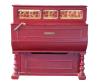 <span class='ref_item'>208 -</span> <span class="description">ORGANILLO ROJO VINTAGE </span>  <p><span class="description">Organillo Vintage realizado en madera pintada en rojo. Posee manubrio, asas laterales y en la parte superior está decorado con telas bordadas con motivos florales.<br>Placa en el centro con la inscripción: "Piano a manubrio de alquiler de Luis Ferrer - Caldas de Malavella (Gerona)" y pegatina interior "Pianos de alquiler de José Ferrer". En el lateral lista de canciones, con variedad de estilos: vals, bolero, foxtrot y paso doble.<br>Necesita ser afinado.<br>125x125x58 cm.</span></p>