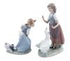 <span class='ref_item'>208 -</span> <span class="object_title">PAREJA DE FIGURAS EN PORCELANA LLADRÓ</span>   <p><span class="technical_description">Figuras realizadas en porcelana policromada que muestran dos esculturas individuales de unas niñas junto a una pareja de ocas y un perro. Ambas piezas contienen el sello de Lladró y Nao Lladró en la base. Una de las figuras presenta roturas.<br/>Medidas niña con ocas: 28x17cm<br/>Medidas niña con perro: 21x15 cm</span><br></p>