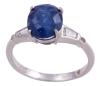 <span class='ref_item'>157 -</span> <span class="object_title">SORTIJA EN ORO 18KT, ZAFIRO Y DIAMANTES</span>  <p><span class="technical_description">Sortija realizada en oro de 18kt con zafiro central en talla oval, engastados en garras, con peso total aprox de 3.75ct y diamantes en talla trapecio y brillante, engastados en bisel y chatón, con un peso total aprox de 0.20ct<br/>Se acompaña de copia de certificado GIL JEW201612141075<br/>Medida Sortija: 12</span><br>Peso: <span class="PESO_HCES1">3,90</span> <span class="PESOUMED_HCES1">gr.</span><br></p>