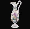 <span class='ref_item'>175 -</span> <span class="object_title">JARRÓN DECORATIVO "CAPODIMONTE"</span>   <p><span class="technical_description">Jarrón decorativo de la marca italiana "Capodimonte" a modo de ánfora. Con decoración en relieve de desnudos y motivos florales en diversos colores. Filo policromado en dorado. Con sello en la base "Capodimonte, Italia, 632"</span><br><span class="ALTO_HCES1">44 </span><span class="ALTOUMED_HCES1">cm.</span>x<span class="ANCHO_HCES1">15 </span><span class="ANCHOUMED_HCES1">cm.</span>x<span class="GRUESO_HCES1">17 </span><span class="GRUESOUMED_HCES1">cm.</span></p>
