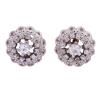 <span class='ref_item'>129 -</span> <span class="object_title">PENDIENTES EN ORO BICOLOR 18KT Y TOPACIOS BLANCOS</span>  <p><span class="technical_description">Pareja de pendientes realizados en oro bicolor de 18kt con roseta en oro blanco y topacios blancos<br/>Cierre: Omega</span><br>Peso: <span class="PESO_HCES1">7,30</span> <span class="PESOUMED_HCES1">gr.</span><br></p>