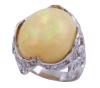 <span class='ref_item'>212 -</span> <span class="object_title">SORTIJA EN ORO 18KT, ÓPALO Y DIAMANTES</span>  <p><span class="technical_description">Sortija realizada en oro de 18kt con gran ópalo central en cabujón oval, engastado en bisel, con peso aprox de 13.75ct y diamantes en talla brillante, engastado en grano, con peso total aprox de 0.90ct.<br/>Se adjunta copia de certificado GCI 1609MRG0637<br/>Medida Sortija: 14</span><br>Peso: <span class="PESO_HCES1">11,40</span> <span class="PESOUMED_HCES1">gr.</span><br></p>