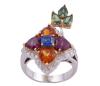 <span class='ref_item'>80 -</span> <span class="object_title">SORTIJA EN ORO BICOLOR 18KT, ZAFIROS, GRANATES Y DIAMANTES</span>  <p><span class="technical_description">Sortija realizada en oro bicolor de 18kt. Con zafiro central en talla cojín y zafiros verdes en perilla, con peso aprox de 1.10ct (0.50ct azul, 0.60ct verdes) y como pétalos granates rodolitas y espesartinas, en talla fantasía con peso aprox de 1.20ct, todos ellos engastados en garras de oro amarillo. Como orla a la flor, diamantes en talla brillante, engastados en grano, con peso total aprox de 0.40ct. <br/>Medida Sortija: 15</span><br>Peso: <span class="PESO_HCES1">10,90</span> <span class="PESOUMED_HCES1">gr.</span><br></p>