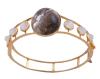 <span class='ref_item'>178 -</span> <span class="object_title">BRAZALETE EN ORO 18KT, CUERZO AHUMADO, PIEDRAS LUNA Y DIAMANTES</span>  <p><span class="technical_description">Brazalete realizado en oro de 18kt. Con gran cabujón central de cuarzo ahumado cristal del Himalaya, con peso aprox 40ct. Diseño calado adornado con cabujones de piedra luna con peso total aprox 5ct y diamantes en talla princesa con un peso total aprox de 0.10ct<br/>Cierre: Lengüeta y cadena de seguridad<br/>Medida interior: 6cm<br/> </span><br>Peso: <span class="PESO_HCES1">25</span> <span class="PESOUMED_HCES1">gr.</span><br></p>