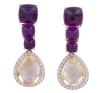 <span class='ref_item'>220 -</span> <span class="object_title">PENDIENTES EN ORO 18KT, AMATISTAS, CITRINOS Y DIAMANTES</span>  <p><span class="technical_description">Pendientes largos con movimiento realizados en oro de 18kt. Con amatistas en talla fantasía con peso total aprox 18ct. En pendentif cuarzos citrinos dorados en talla perilla facetada con peso total aprox 12.50ct con orla de diamantes en talla brillante con peso total aprox 0.80ct. <br/>Cierre: Presión<br/>Longitud: 4cm</span><br>Peso: <span class="PESO_HCES1">17,30</span> <span class="PESOUMED_HCES1">gr.</span><br></p>