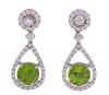 <span class='ref_item'>113 -</span> <span class="object_title">PENDIENTES EN ORO 18KT, PERIDOTOS Y DIAMANTES, DESMONTABLES</span>  <p><span class="technical_description">Pareja de pendientes realizados en oro de 18kt. Desmontables, quedando como botón de dormilona. Adornados con diamantes talla brillante, engastados garras, con un peso total aprox de 0.90ct y con peridotos en talla redonda engastado en garras, con peso total aprox de 3.40ct.<br/>Se adjunta copia de certificado EMIL 87027-2.3<br/>Cierre: Presión</span><br>Peso: <span class="PESO_HCES1">7</span> <span class="PESOUMED_HCES1">gr.</span><br></p>