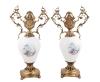<span class='ref_item'>176 -</span> <span class="object_title">PAREJA DE JARRONES DECORATIVOS</span>   <p><span class="technical_description">En cerámica y base y remate en bronce dorado. Decorados con escenas galantes. <br/>Medidas: 43x23cm</span><br></p>