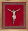 <span class='ref_item'>71 -</span> <span class="object_title">CRISTO CRUCIFICADO</span>   <p><span class="author">ESCUELA ESPAÑOLA S.XIX  </span> <br><span class="technique_material">Madera</span><br><span class="technical_description">Realizado en madera tallada y parcialmente policromada. Sobrepuesto sobre madera cubierta de terciopelo rojo y pasamanería. <br/>Enmarcado.<br/>Muestra algunos desperfectos. <br/>Medida de la talla: 26 x 23cm</span><br></p>