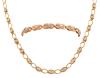 <span class='ref_item'>52 -</span> <span class="object_title">GARGANTILLA Y PULSERA EN ORO 18KT Y CIRCONITAS</span>  <p><span class="technical_description">Conjunto de gargantilla y pulsera realizados en oro de 18kt con eslabón fantasía adornados con circonitas<br/>Cierre: Caja con lengüeta y ocho de seguridad la pulsera, mosquetón la gargantilla<br/>Longitud: 50cm la gargantilla y 17cm la pulsera</span><br>Peso: <span class="PESO_HCES1">25,80</span> <span class="PESOUMED_HCES1">gr.</span><br></p>