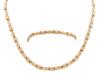 <span class='ref_item'>180 -</span> <span class="object_title">GARGANTILLA Y PULSERA EN ORO 18KT</span>  <p><span class="technical_description">Conjunto de gargantilla y pulsera realizados en oro de 18kt con eslabón fantasía combinando mate y brillo<br/>Cierre: Caja con lengüeta y ocho de seguridad<br/>Longitud: 45cm la gargantilla y 19cm la pulsera</span><br>Peso: <span class="PESO_HCES1">21,70</span> <span class="PESOUMED_HCES1">gr.</span><br></p>