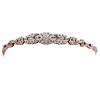 <span class='ref_item'>29 -</span> <span class="object_title">PULSERA DE PEDIDA EN ORO 14KT, PLATA DE LEY Y ZAFIROS BLANCOS. PP S.XX</span>  <p><span class="technical_description">Pulsera de pedida de principios del siglo XX realizada en oro de 14kt. Composición floral con vistas en plata de ley adornada con zafiros blancos<br/>Cierre: Caja con lengüeta y cadena de seguridad<br/>Longitud: 18cm</span><br>Peso: <span class="PESO_HCES1">6,50</span> <span class="PESOUMED_HCES1">gr.</span><br></p>