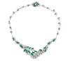 <span class='ref_item'>58 -</span> <span class="object_title">GARGANTILLA EN ORO 18KT, ESMERALDA Y DIAMANTES</span>  <p><span class="technical_description">Gargantilla realizado en oro de 18kt. Adornada toda ella por esmeraldas en talla redonda y marquise de peso aprox 6.50ct y diamantes en reasa en talla brillante con peso total aprox de 11.50ct<br/>Cierre: Caja con lengüeta y mecanismo de seguridad<br/>Longitud: 38cm</span><br>Peso: <span class="PESO_HCES1">39,70</span> <span class="PESOUMED_HCES1">gr.</span><br></p>