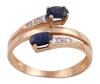 <span class='ref_item'>209 -</span> <span class="object_title">SORTIJA EN ORO 18KT, ZAFIROS Y DIAMANTES</span>  <p><span class="technical_description">Sortija "Tú y yo" realizada en oro de 18kt. Con dos zafiros cruzados en talla oval con peso total aprox 0.50ct y diamantes en talla brillante con peso total aprox 0.04ct<br/>Medida Sortija: 11</span><br>Peso: <span class="PESO_HCES1">2,20</span> <span class="PESOUMED_HCES1">gr.</span><br></p>