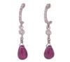 <span class='ref_item'>262 -</span> <span class="object_title">PENDIENTES EN ORO 18KT, RUBÍES Y DIAMANTES</span>  <p><span class="technical_description">Pareja de pendientes con movimiento realizados en oro de 18kt. Formados por rubíes masivos en cabujón con forma de gota y peso total aprox 1.60ct y en la parte superior diamantes en talla brillante con peso total aprox 0.20ct. <br/>Cierre: Presión<br/>Longitud: 3cm</span><br>Peso: <span class="PESO_HCES1">2,40</span> <span class="PESOUMED_HCES1">gr.</span><br></p>