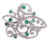 <span class='ref_item'>237 -</span> <span class="object_title">BROCHE EN ORO 9KT, ESMERALDAS Y DIAMANTES</span>  <p><span class="technical_description">Broche realizado en oro bajo de 9kt. Diseño calado con bandas onduladas, adornado por esmeraldas en talla redonda con peso total aprox 1.23ct y diamantes en talla brillante con peso total aprox 0.90ct<br/>Cierre: Aguja con mecanismo de seguridad<br/>Medidas: 4,5 x 4cm cada parte</span><br>Peso: <span class="PESO_HCES1">12,80</span> <span class="PESOUMED_HCES1">gr.</span><br></p>