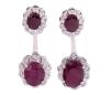 <span class='ref_item'>108 -</span> <span class="object_title">PENDIENTES DESMONTABLES EN ORO 18KT, RUBÍES Y DIAMANTES</span>  <p><span class="technical_description">Pareja de pendientes desmontables realizados en oro de 18kt. Diseño de rosetas con rubíes centrales en talla oval con peso total aprox 14.75ct (3.41 los superiores y 11.34ct los inferiores). Orla de diamantes en talla brillante con peso total aprox 0.81ct (0.30ct superiores y 0.51ct inferiores)<br/>Cierre: Presión<br/>Longitud: 3,5cm</span><br>Peso: <span class="PESO_HCES1">14,50</span> <span class="PESOUMED_HCES1">gr.</span><br></p>