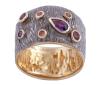 <span class='ref_item'>224 -</span> <span class="object_title">SORTIJA EN PLATA 925 CON CHAPADO EN ORO, AMATISTA, ESPESANTINA Y CITRINOS. JOYERÍA DE AUTOR, PIEZA ÚNICA</span>  <p><span class="technical_description">Sortija realizada en plata de ley 925 con contraste y partes chapadas en oro. Ancha, adornada por una amatista en talla perilla con peso total aprox 0.20ct, granate espesantina en talla redonda con peso total aprox 0.10ct y cuarzos citrinos con peso total aprox 0.04ct. <br/>Medida Sortija: 13</span><br>Peso: <span class="PESO_HCES1">9,70</span> <span class="PESOUMED_HCES1">gr.</span><br></p>