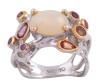 <span class='ref_item'>64 -</span> <span class="object_title">SORTIJA EN PLATA 925 CON CHAPADO EN ORO, ÓPALO DE AGUA, AMATISTAS, ZAFIROS Y RUBÍES. JOYERÍA DE AUTOR, PIEZA ÚNICA</span>  <p><span class="technical_description">Sortija realizada en plata de ley 925 con contraste y partes chapadas en oro. Ópalo de agua central en cabujón oval con peso aprox 2.50ct, amatistas con peso total aprox 0.04ct, zafiros dorados con peso total aprox 0.15ct y rubíes con peso total aprox 0.20ct<br/>Medida Sortija: 14</span><br>Peso: <span class="PESO_HCES1">7,30</span> <span class="PESOUMED_HCES1">gr.</span><br></p>
