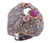 <span class='ref_item'>246 -</span> <span class="object_title">SORTIJA EN PLATA 925 CON CHAPADO EN ORO, RUBÍES Y ZAFIROS DORADOS. JOYERÍA DE AUTOR, PIEZA ÚNICA</span>  <p><span class="technical_description">Sortija realizada en plata de ley 925 con contraste y partes chapadas en oro. Rubíes en cabujón y talla redonda con peso total aprox 0.55ct y zafiros dorados con peso total aprox 0.12ct<br/>Medida Sortija: Regulable</span><br>Peso: <span class="PESO_HCES1">9,90</span> <span class="PESOUMED_HCES1">gr.</span><br></p>