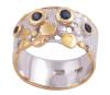 <span class='ref_item'>212 -</span> <span class="object_title">SORTIJA EN PLATA 925 CON CHAPADO EN ORO Y ZAFIROS. JOYERÍA DE AUTOR, PIEZA ÚNICA</span>  <p><span class="technical_description">Sortija realizada en plata de ley 925 con contraste y partes chapadas en oro. Ancha con cuatro zafiros en talla redonda y peso aprox 0.18ct<br/>Medida Sortija: 12</span><br>Peso: <span class="PESO_HCES1">5,10</span> <span class="PESOUMED_HCES1">gr.</span><br></p>
