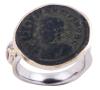 <span class='ref_item'>42 -</span> <span class="object_title">SORTIJA EN PLATA 925 CON CHAPADO EN ORO, MONEDA ROMANA Y AMATISTA. JOYERÍA DE AUTOR, PIEZA ÚNICA</span>  <p><span class="technical_description">Sortija realizada en plata de ley 925 con contraste y partes chapadas en oro. Con una moneda del Bajo Imperio Romano, un follis de Constancio II (324-337 d.C.) en bronce y en su reverso la imagen de la puerta de un campamento. A un lado una amatista en talla redonda de peso aprox 0.07ct<br/>Medida Sortija: 13</span><br>Peso: <span class="PESO_HCES1">7,40</span> <span class="PESOUMED_HCES1">gr.</span><br></p>