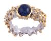 <span class='ref_item'>236 -</span> <span class="object_title">SORTIJA EN PLATA 925 CON CHAPADO EN ORO Y ZAFIRO. JOYERÍA DE AUTOR, PIEZA ÚNICA</span>  <p><span class="technical_description">Sortija realizada en plata de ley 925 con contraste y partes chapadas en oro. Adornada por un zafiro en cabujón oval con peso aprox 2ct<br/>Medida Sortija: 16</span><br>Peso: <span class="PESO_HCES1">9</span> <span class="PESOUMED_HCES1">gr.</span><br></p>