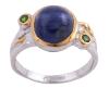 <span class='ref_item'>125 -</span> <span class="object_title">SORTIJA EN PLATA 925 CON CHAPADO EN ORO, ZAFIRO Y TURMALINAS VERDES. JOYERÍA DE AUTOR, PIEZA ÚNICA</span>  <p><span class="technical_description">Sortija realizada en plata de ley 925 con contraste y partes chapadas en oro. Zaafiro central en cabujón oval con peso aprox3.20ct y turmalinas verdes en talla redonda con peso aprox 0.07ct<br/>Medida Sortija: 16</span><br>Peso: <span class="PESO_HCES1">5,80</span> <span class="PESOUMED_HCES1">gr.</span><br></p>