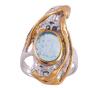 <span class='ref_item'>127 -</span> <span class="object_title">SORTIJA EN PLATA 925 CON CHAPADO EN ORO, AGUAMARINA Y TOPACIOS. JOYERÍA DE AUTOR, PIEZA ÚNICA</span>  <p><span class="technical_description">Sortija realizada en plata de ley 925 con contraste y partes chapadas en oro. Diseño lanzadera con un aguamarina en cabujón oval de peso aprox 3ct y topacios azules en talla redonda con peso total aprox 0.07ct. <br/>Medida Sortija: 14</span><br>Peso: <span class="PESO_HCES1">10</span> <span class="PESOUMED_HCES1">gr.</span><br></p>