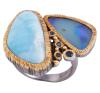 <span class='ref_item'>34 -</span> <span class="object_title">SORTIJA EN PLATA 925 CON CHAPADO EN ORO, LARIMAR, ÓPALO Y ZAFIROS. JOYERÍA DE AUTOR, PIEZA ÚNICA</span>  <p><span class="technical_description">Sortija realizada en plata de ley 925 con contraste y partes chapadas en oro. Adornada por una placa de larimar y otra lisa de ópalo azul. En medio zafiros en talla redonda con peso total aprox 0.06ct<br/>Medida Sortija: 15</span><br>Peso: <span class="PESO_HCES1">13,30</span> <span class="PESOUMED_HCES1">gr.</span><br></p>