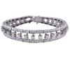 <span class='ref_item'>184 -</span> <span class="object_title">PULSERA EN ORO 18KT Y DIAMANTES</span>  <p><span class="technical_description">Pulsera realizada en oro de 18kt. Banda central y a los lados bandas articuladas en dúo de diamantes por diamantes en talla brillante con un peso total aprox de 3.80ct. <br/>Cierre: Lengüeta, ocho y cadena de seguridad<br/>Longitud: 17cm</span><br>Peso: <span class="PESO_HCES1">43,90</span> <span class="PESOUMED_HCES1">gr.</span><br></p>