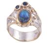 <span class='ref_item'>120 -</span> <span class="object_title">SORTIJA EN PLATA 925 CON CHAPADO EN ORO, LABRADORITA Y ZAFIROS. JOYERÍA DE AUTOR, PIEZA ÚNICA</span>  <p><span class="technical_description">Sortija realizada en plata de ley 925 con contraste y partes chapadas en oro. Labradorita en cabujón oval con peso aprox 0.60ct y dos zafiros en talla redonda con peso total aprox 0.08ct<br/>Medida Sortija: 12</span><br>Peso: <span class="PESO_HCES1">5,40</span> <span class="PESOUMED_HCES1">gr.</span><br></p>