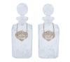 <span class='ref_item'>291 -</span> <span class="object_title">PAREJA DE LICORERAS EN CRISTAL TALLADO Y DETALLES EN PLATA 925</span>  <p><span class="technical_description">Pareja de licoreras realizada en cristal tallado con tapa esférica facetada. Acompañadas de medallón con cadena, repujado en plata de ley 925, con inscripción "Brandy" y "Whisky". </span><br></p>