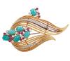 <span class='ref_item'>106 -</span> <span class="object_title">BROCHE EN ORO BICOLOR 18KT, RUBÍES, AMAZONITAS Y DIAMANTES</span>  <p><span class="technical_description">Broche vintage realizado en oro bicolor de 18kt. Diseño de hoja con cordoncillos calados, adornado por diamantes en bandas y en motivo central en talla brillante con peso total aprox 0.50ct. También rubíes en talla redonda con peso total aprox 0.30ct y amazonitas en cabujón oval con un peso total 2.70ct<br/>Cierre: Aguja con mecanismo de seguridad<br/>Medidas: 6 x 3,5cm<br/> </span><br>Peso: <span class="PESO_HCES1">20,20</span> <span class="PESOUMED_HCES1">gr.</span><br></p>