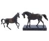 <span class='ref_item'>188 -</span> <span class="object_title">PAREJA DE CABALLOS EN METAL</span>   <p><span class="technical_description">Pareja de caballos realizados en metal repujado. Uno de ellos sobre base de mármol negro veteado.<br/>Medidas con base: 20x25x10; 20x20cm</span><br></p>