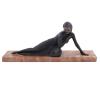 <span class='ref_item'>163 -</span> <span class="object_title">MUJER RECOSTADA</span>   <p><span class="technique_material">Bronce</span><br><span class="technical_description">Figura de bronce colocada sobre una base de mármol claro veteado. <br/>Medidas con base: 17x40x8.5cm</span><br></p>
