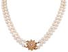 <span class='ref_item'>77 -</span> <span class="object_title">COLLAR DE PERLAS CULTIVADAS Y BROCHE EN ORO 18KT CON GRANATES</span>  <p><span class="technical_description">Collar de dos hilos de perlas cultivadas en color blanco calibradas aprox en 7,5mm. Broche realizado en oro 18kt, con granates y pequeñas perlas cultivadas<br/>Cierre: Caja con lengüeta<br/>Longitud: 50cm</span><br>Peso: <span class="PESO_HCES1">80,30</span> <span class="PESOUMED_HCES1">gr.</span><br></p>