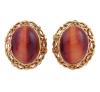 <span class='ref_item'>202 -</span> <span class="object_title">PENDIENTES EN ORO 18KT Y CUARZO OJO DE TIGRE</span>  <p><span class="technical_description">Pareja de pendientes realizados en oro de 18kt. Con cuarzos ojo de tigre en cabujón y orla calada<br/>Cierre: Omega</span><br>Peso: <span class="PESO_HCES1">9,80</span> <span class="PESOUMED_HCES1">gr.</span><br></p>
