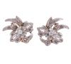 <span class='ref_item'>15 -</span> <span class="object_title">PENDIENTES VINTAGE EN ORO BICOLOR 18KT Y DIAMANTES</span>  <p><span class="technical_description">Pareja de pendientes vintage realizados en oro bicolor de 18kt. Motivos florales adornados por diamantes en talla rosa y brillante con un peso total aprox de 0.30ct<br/>Cierre: Ballestilla</span><br>Peso: <span class="PESO_HCES1">6,40</span> <span class="PESOUMED_HCES1">gr.</span><br></p>