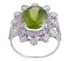 <span class='ref_item'>147 -</span> <span class="object_title">SORTIJA EN ORO 18KT, PERIDOTO Y DIAMANTES</span>  <p><span class="technical_description">Sortija realizada en oro de 18kt. Con un peridoto central en talla oval de peso aprox 4ct y en hombros y en orla diamantes en talla brillante con peso total aprox 0.38ct. <br/>Medida Sortija: 14<br/>RefC 4724</span><br>Peso: <span class="PESO_HCES1">5,20</span> <span class="PESOUMED_HCES1">gr.</span><br></p>