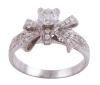 <span class='ref_item'>242 -</span> <span class="object_title">SORTIJA EN ORO 18KT Y DIAMANTES</span>  <p><span class="technical_description">Sortija realizada en oro de 18kt. Diseño de lazo adornado por diamantes en talla brillante con peso total aprox 0.65ct (0.25ct el central). Se acompaña de copia de certificado GIL JEW201709221918<br/>Medida Sortija: 12<br/>RefC 4874</span><br>Peso: <span class="PESO_HCES1">3,90</span> <span class="PESOUMED_HCES1">gr.</span><br></p>