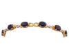 <span class='ref_item'>11 -</span> <span class="object_title">PULSERA EN ORO BICOLOR 18KT, ZAFIROS Y DIAMANTES</span>  <p><span class="technical_description">Pulsera realizada en oro bicolor de 18kt. Adornada por zafiros en talla oval con peso total aprox 15ct, unidos por eslabones pequeños cuajados de diamantes en talla brillante sobre vistas en blanco con peso total aprox 0.20ct. <br/>Cierre: Caja con lengüeta y doble ocho de seguridad<br/>Longitud: 17cm<br/>RefC 2155</span><br>Peso: <span class="PESO_HCES1">15,80</span> <span class="PESOUMED_HCES1">gr.</span><br></p>