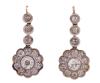 <span class='ref_item'>62 -</span> <span class="object_title">PENDIENTES VINTAGE EN ORO 18KT, VISTAS EN PLATINO Y DIAMANTES</span>  <p><span class="technical_description">Pareja de pendientes vintage realizados en oro de 18kt con vistas en platino. Largos con tres chatones y gran roseta, adornados por diamantes en talla brillante transición, los centrales con peso aprox 1.10ct cada uno, 0.15ct aprox cada uno de los chatones y 1ct aprox cada orla. Peso aprox total de todos los diamantes 5ct<br/>Cierre: Ballestilla<br/>Longitud: 4cm</span><br>Peso: <span class="PESO_HCES1">8,70</span> <span class="PESOUMED_HCES1">gr.</span><br></p>