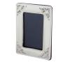 <span class='ref_item'>39 -</span> <span class="object_title">MARCO EN PLATA 925 CON CONTRASTES </span>  <p><span class="technical_description">Cristal y parte trasera en madera. Con decoración de motivos decorativos en esquina. <br/>Marca SERGIO MARTINI. Con caja.<br/>Medidas: 12,5x9,5cm</span><br>Peso: <span class="PESO_HCES1">120</span> <span class="PESOUMED_HCES1">gr.</span><br></p>