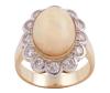 <span class='ref_item'>61 -</span> <span class="object_title">SORTIJA EN ORO BICOLOR 18KT, ÓPALO Y DIAMANTES</span>  <p><span class="technical_description">Sortija realizada en oro bicolor de 18kt. Gran ópalo central en cabujón oval con peso aprox 3ct y en orla diamantes en talla brillante con peso total aprox 0.25ct.<br/>Medida Sortija: 13<br/>RefC 32</span><br>Peso: <span class="PESO_HCES1">9,10</span> <span class="PESOUMED_HCES1">gr.</span><br></p>