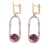 <span class='ref_item'>51 -</span> <span class="object_title">PENDIENTES EN PLATA 925 CON CHAPADO EN ORO Y AMATISTAS</span>  <p><span class="technical_description">Pendientes largos con movimiento realizados en plata de ley 925 con partes chapadas en oro. Adornados por amatistas en talla oval con peso total aprox 1.80ct. Grabado en placa posterior "handmade"<br/>Cierre: Ballestilla<br/>Longitud: 4,5cm<br/>RefC GE 4650</span><br>Peso: <span class="PESO_HCES1">6,80</span> <span class="PESOUMED_HCES1">gr.</span><br></p>