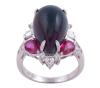 <span class='ref_item'>90 -</span> <span class="object_title">SORTIJA EN ORO 18KT, ÓPALO, RUBÍES Y DIAMANTES</span>  <p><span class="technical_description">Sortija realizada en oro de 18kt. Ópalo central en cabujón forma de perilla con peso aprox 6.50ct, rubíes en talla perilla con peso total aprox 0.60ct y diamantes en talla baguette y brillante con peso total aprox 0.60ct<br/>Medida Sortija: 15<br/>RefC 801217565</span><br>Peso: <span class="PESO_HCES1">7,30</span> <span class="PESOUMED_HCES1">gr.</span><br></p>