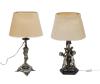 <span class='ref_item'>172 -</span> <span class="object_title">PAREJA DE LÁMPARAS DE MESA EN METAL PLATEADO</span>   <p><span class="technical_description"> Cuerpos en metal plateado repujado con figuras portando vides y a modo de columna. Una de ellas con base de mármol negro veteado. Con cables de alimentación. <br/>Medidas: 55x20cm</span><br></p>