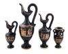 <span class='ref_item'>165 -</span> <span class="object_title">CONJUNTO DE CUATRO ÁNFORAS ESTILO GRIEGO</span>   <p><span class="technical_description">En cerámica barnizada en negro con detalles en dorado. <br/>Distintos tamaños. Con sello en la base. </span><br></p>